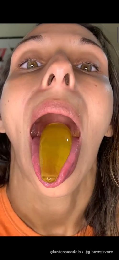 This girl swallow a big banana jelly whole