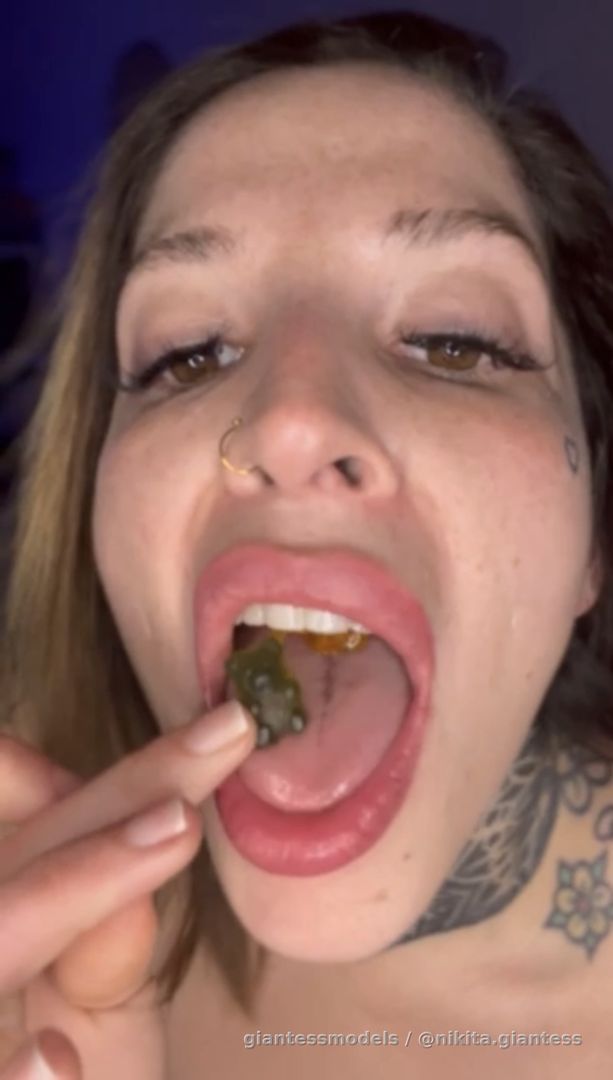 Your giantess Nikita swallows colorful gummy bears naked