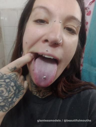 Pierced girl uvula and tongue show
