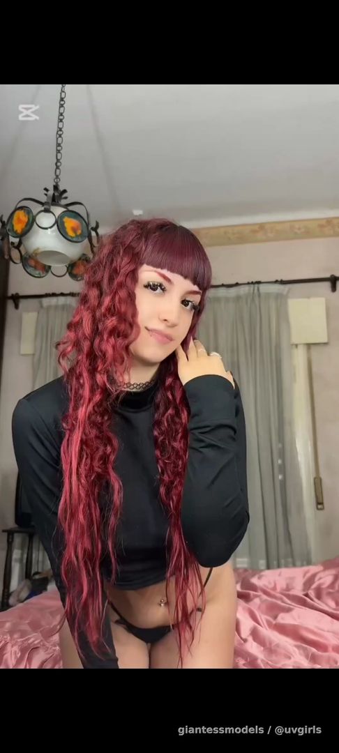 Latina shows and touches her uvula 