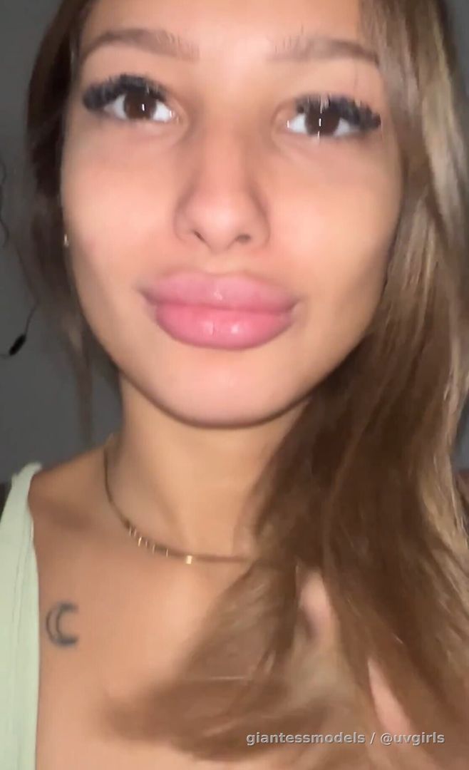 Beautiful girl shows her long uvula and touches it, very big gags