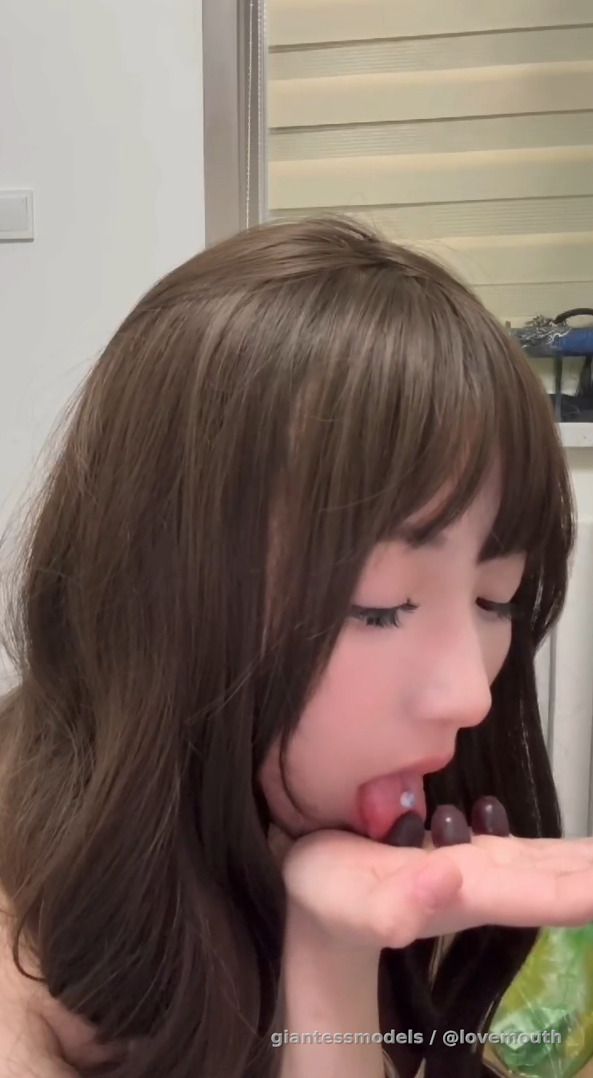 Girl eats gummy candy