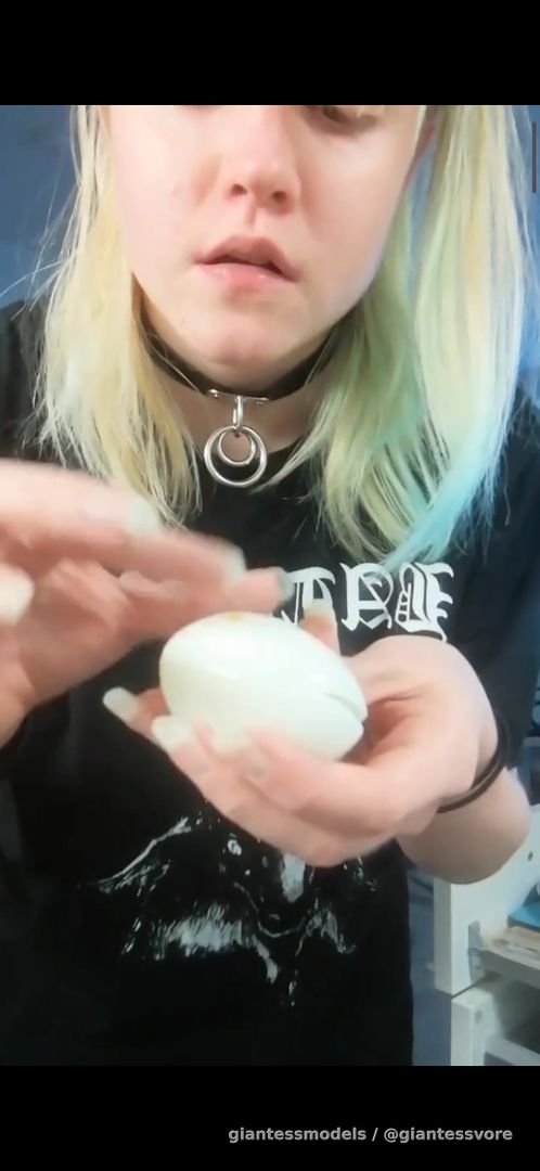 Blonde girl swallow whole two eggs