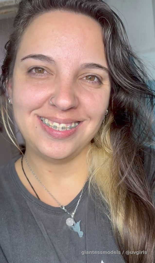 Girl with braces touches his bifid big uvula