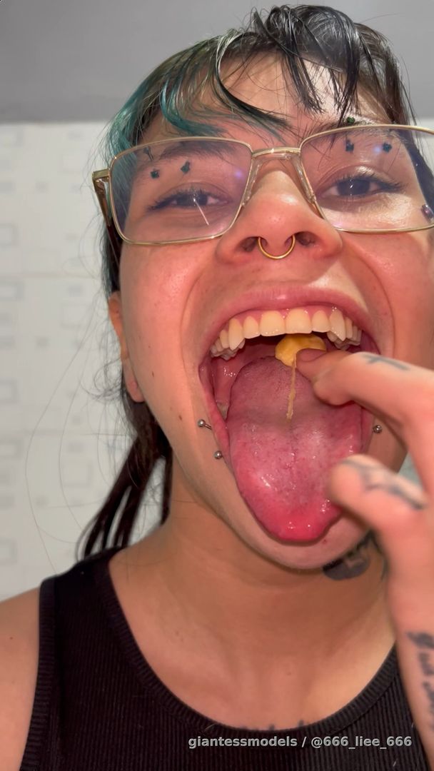 Swallowing a piece of fruit