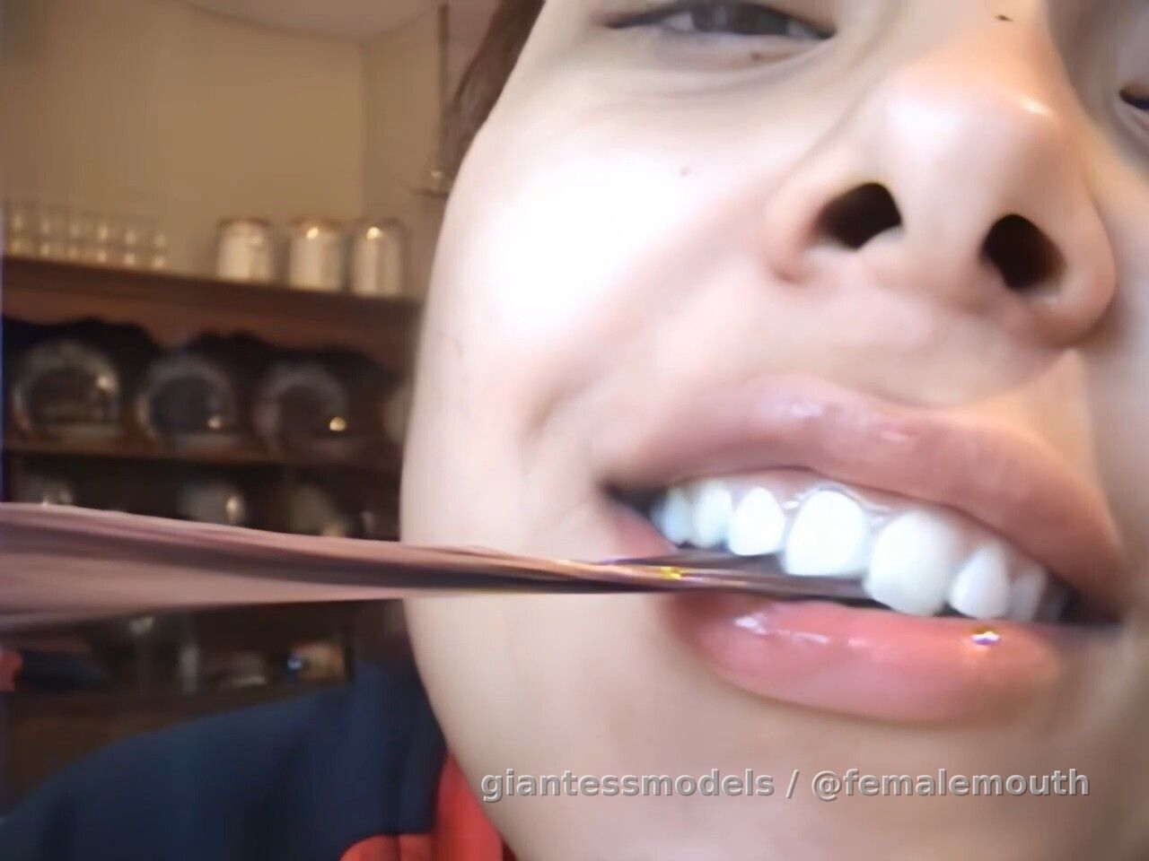 Sexy brunette is chewing and playing with a gum. Very, very old and blurry clip, now reconstructed with Neural Networks, the picture is GOOD now!!!