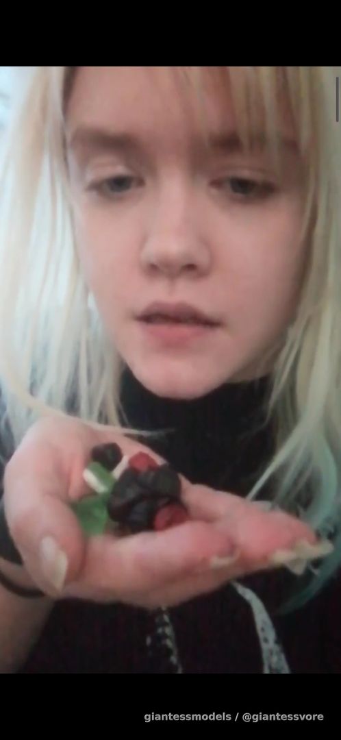 Blonde girl swallow lot of gummy in same time