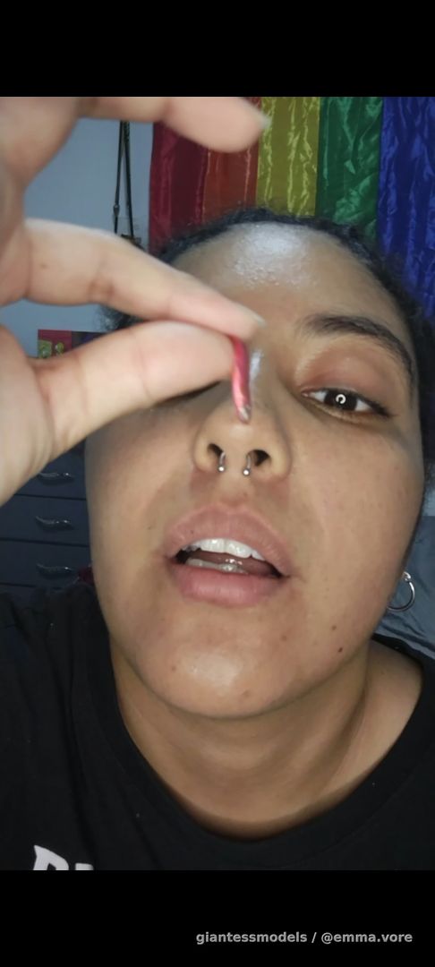 Vore, goldfish being decorated by this Latina.