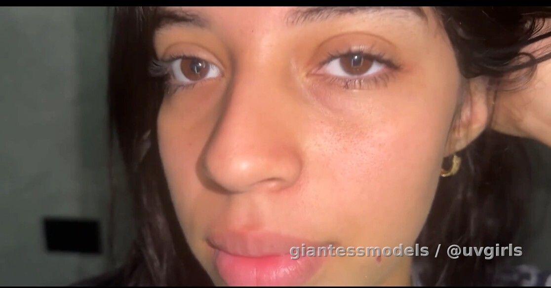 The same latina with braces, touches her uvula and gags showing her epiglottis