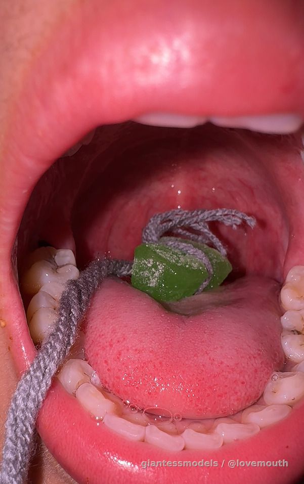 Girl tied a candy with string and swallowed it before pulling it out of her stomach