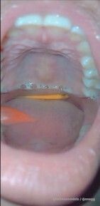 Girl swallows 2 fish open Mouth and Burps nasty.