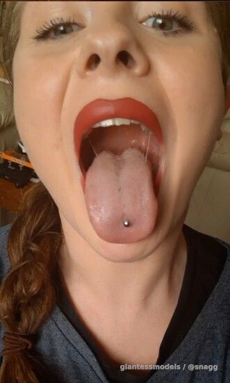 Hot Red haired Girl sucks Dildo with living fish and swallows him down after.