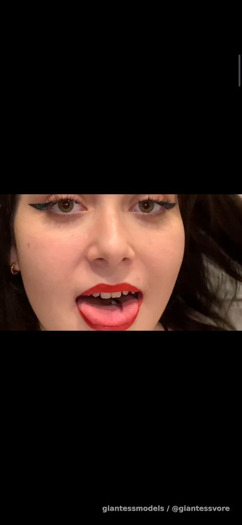 Wonderful girl swallow lot of fishes whole with her open mouth