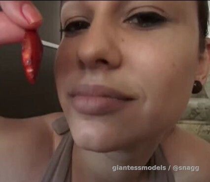 Giantess gulps down fish