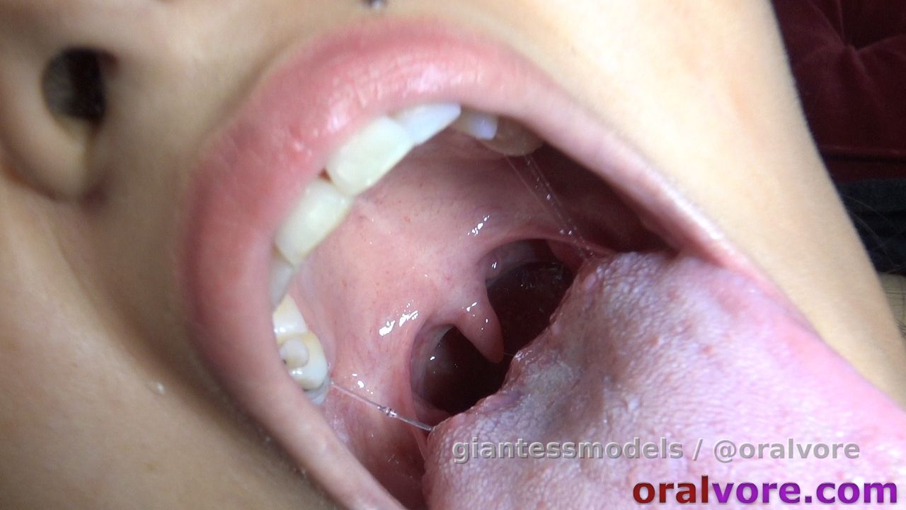 KV11S60fps – Kim’s Open Mouth in SloMo – We shot Kim dropping guppies into her throat at 60 frames per second. You will see them go down in real time, and them again in very smooth slow motion… it’s effing crazy!!!! See them hit her uvula, and her uvula wiggles like jello from the impact, as the guppy falls into her abyss. It’s really quite amazing to see.