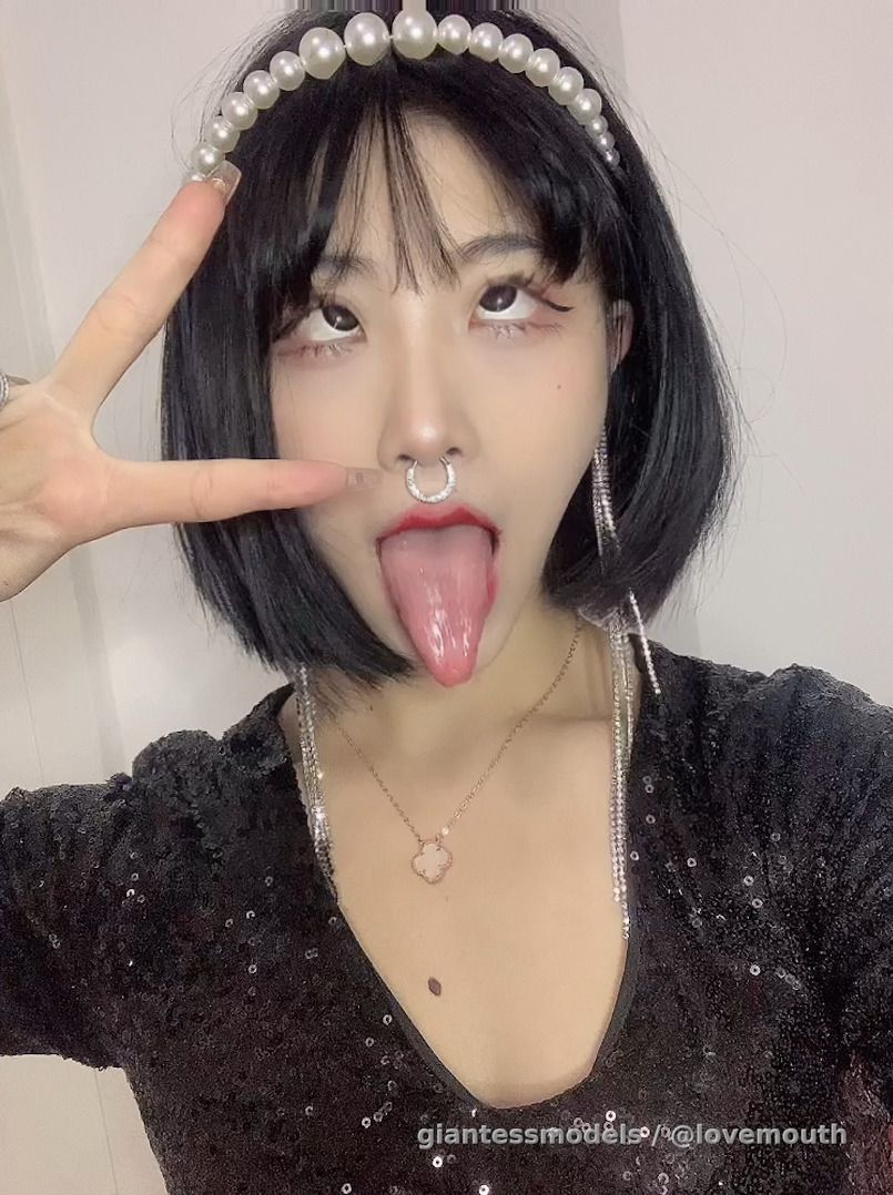 Long tongue girl's mouth