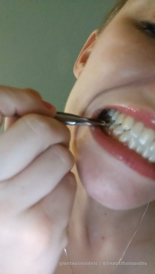 Lipstick mouth inspection and teeth picking