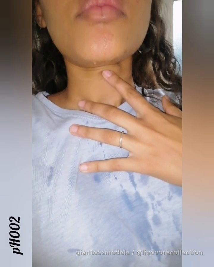 Girl tries swallowing big fish