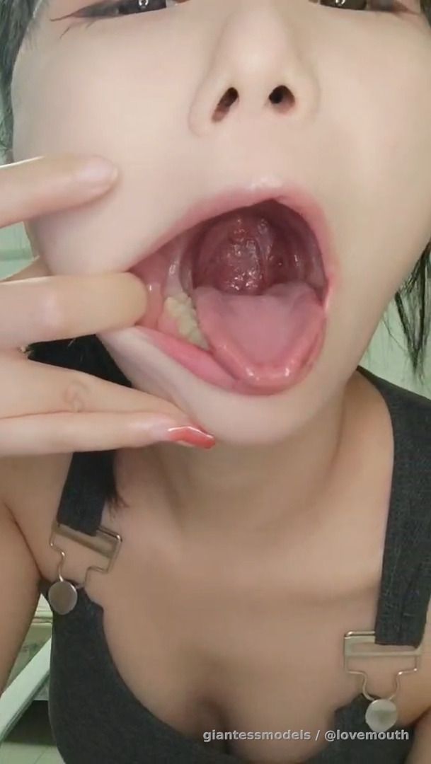 Girl simulating oral sex