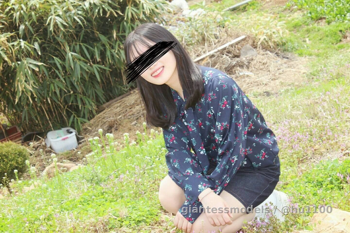 A Korean student shows her mouth.