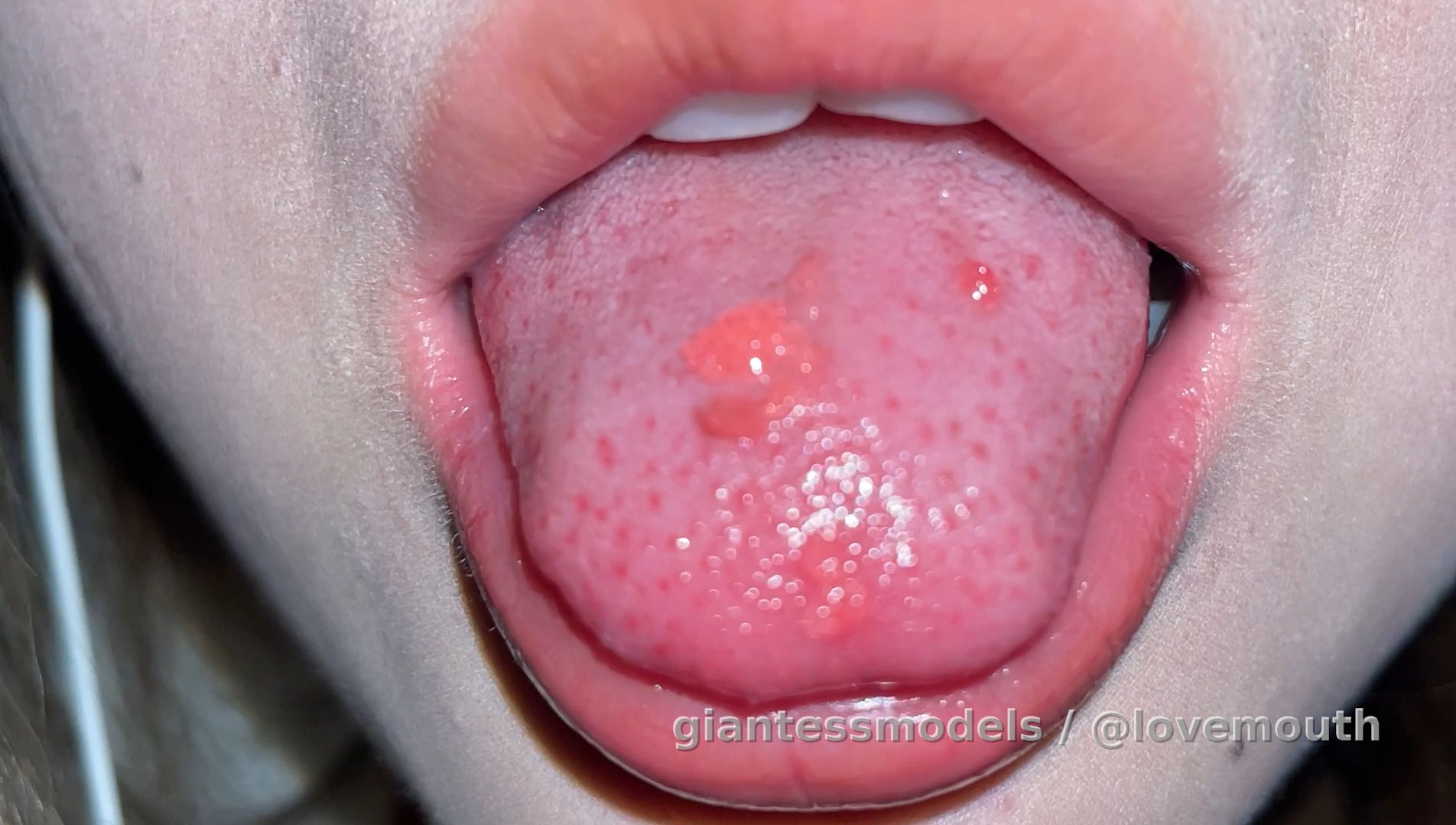 Pure girl eating popping candy