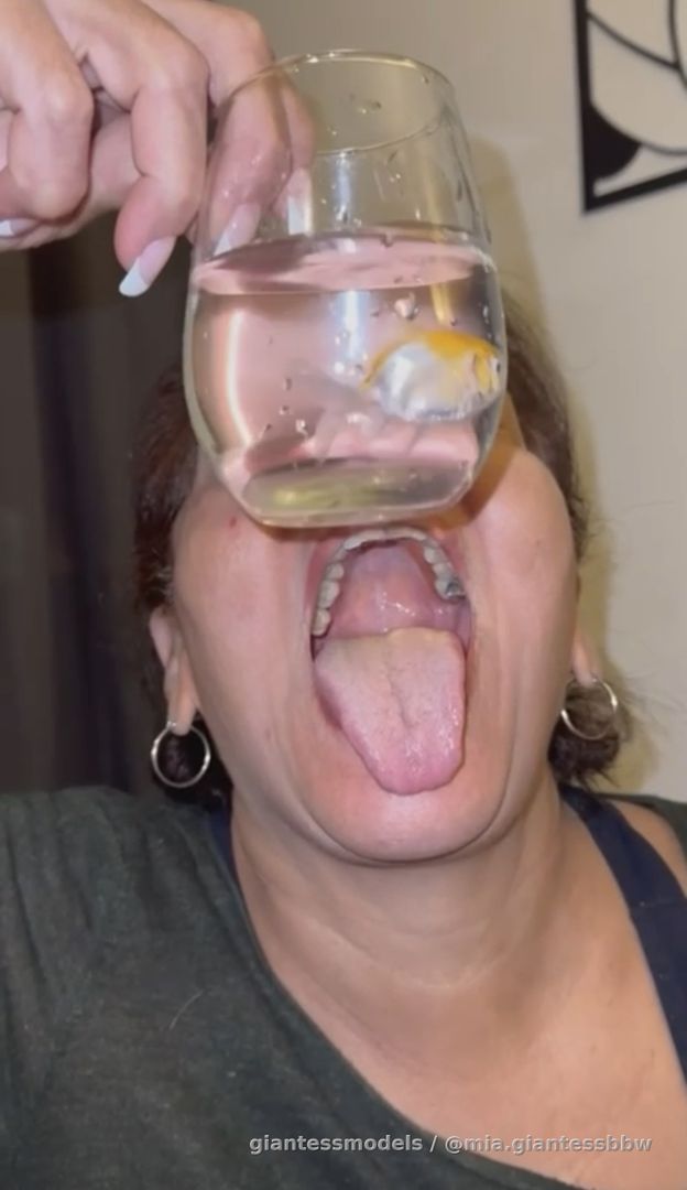 MILF BBW humiliates a live fish and swallows it to live in her belly🐠