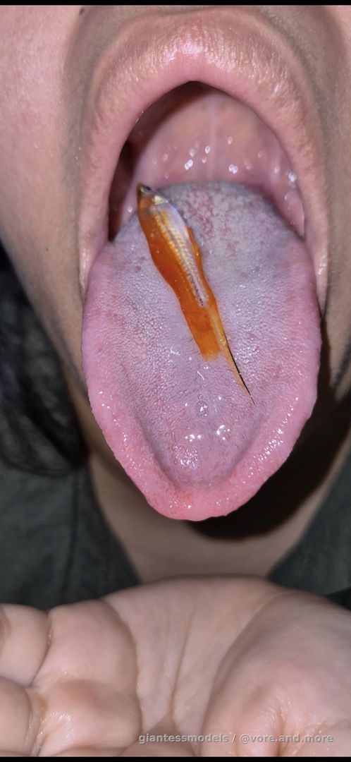 Long tongue girl swallow fish 