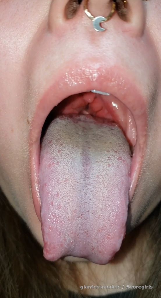 A litle Cutie teases small fish before sending it down for digestion.