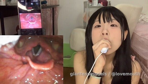 Girl performs vocal cord examination herself