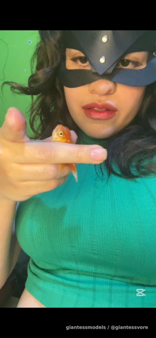 Latina girl swallow whole multiples big goldfish