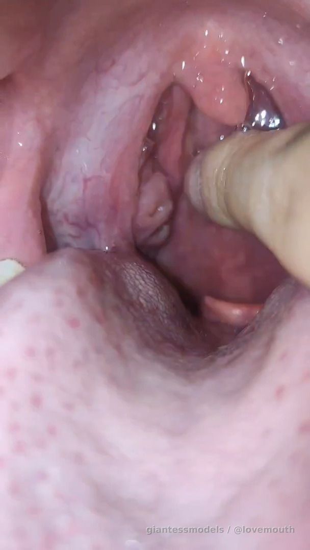 Girl scratches her throat causing retching