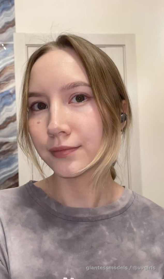 Pretty girl shows her uvula and touches it