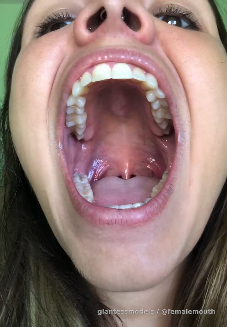 Beautiful girl shows her mouth and her FLAWLESS 32 GEMS!!! Don't you wish to roll a finger or... a dick on top of those straight, rough, edged surfaces? What a FUCKING sexy mouth, huh?