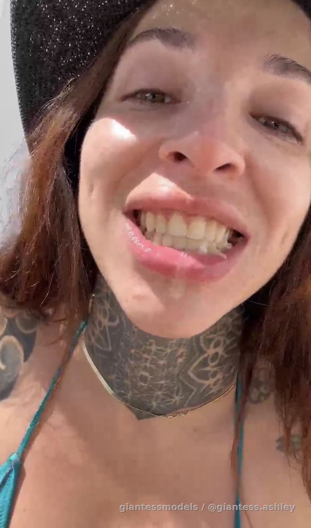 Your dirty giantess Ashley munches an apple while she relaxes