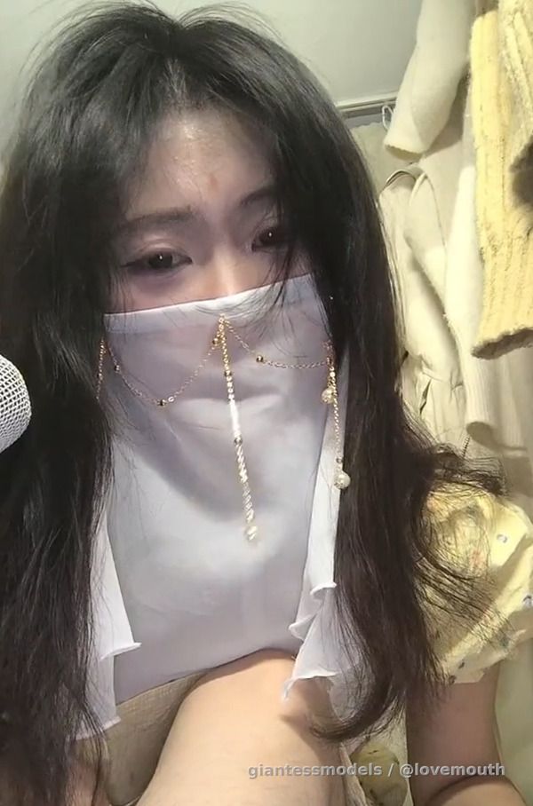 A girl's mouth and feet