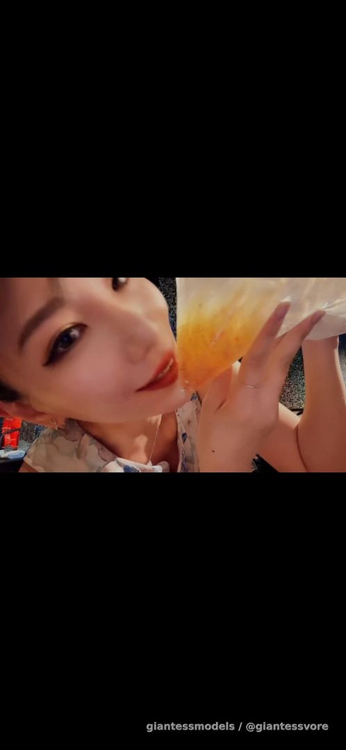 Cute asian girl swallow lot of fishes