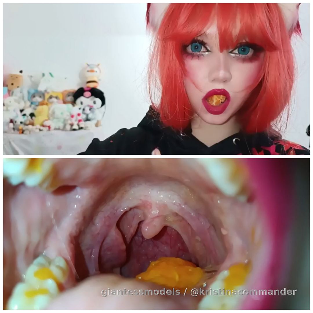 Fox cosplay eating mandarin + swallowing close up (video 1 min)