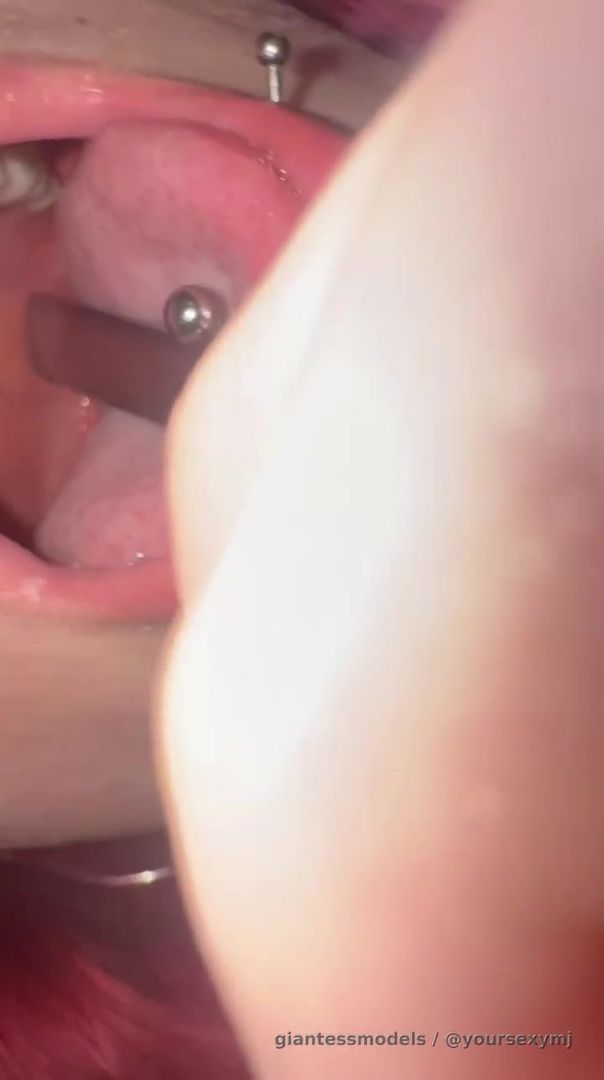 I examine my throat with the back of a spoon. 
I do sequences where I push my tongue down with my finger and then insert the back of the spoon. I GAGG!! The back of my throat is clearly visible from outside. My tongue ring makes it so much hotter! 
The moan sounds I make would make you get a hard boner for sure. 