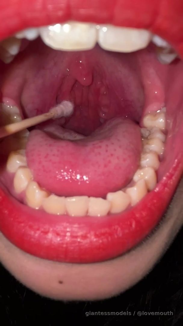 The girl showed her mouth and gagged.