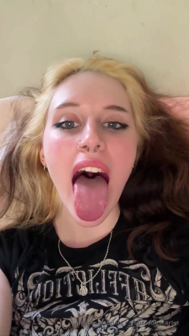 Sticking my Tongue out and doing AAAAA as you little tinies can see what my giantess mouth looks like. Terrified?