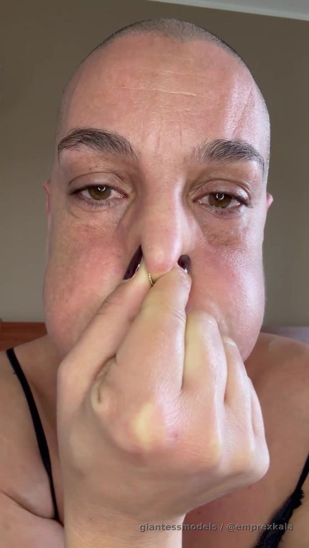 puffing my cheeks very hard until turning red while controlling my breath for almost a minute each time I puff them. moaning as i am struggling. 