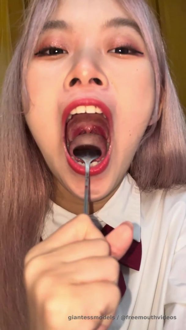 Asian model showing mouth and uvula (Free)