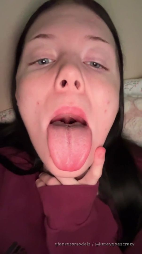 A young adult still at her teens asking you to cum on her mouth with her long and wide tongue out wide