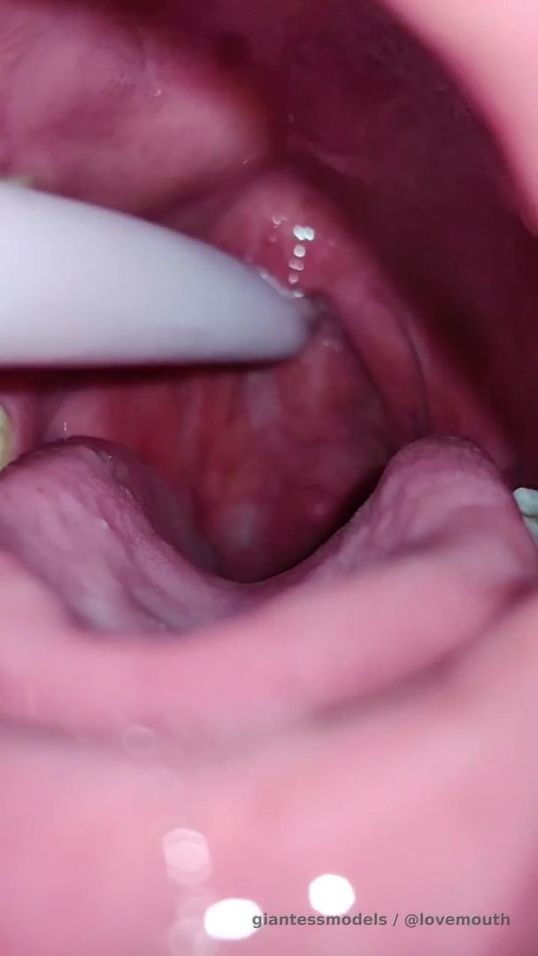 The girl fiddled with her throat and retched