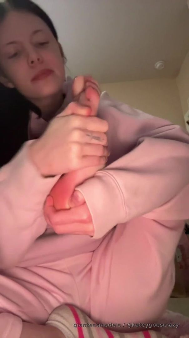 Licking my feet with lots of saliva and showing off my soles