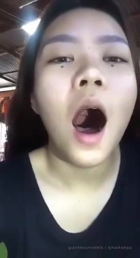 Chubby girl show her uvula and play with it
